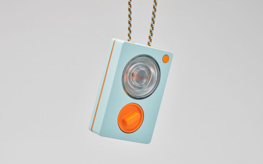 Photo of the Ambessa Play flashlight hanging from a lanyard