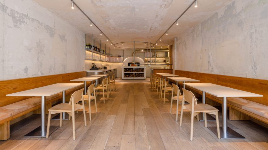 Nave-like interior of Pizzeria Della Madonna
