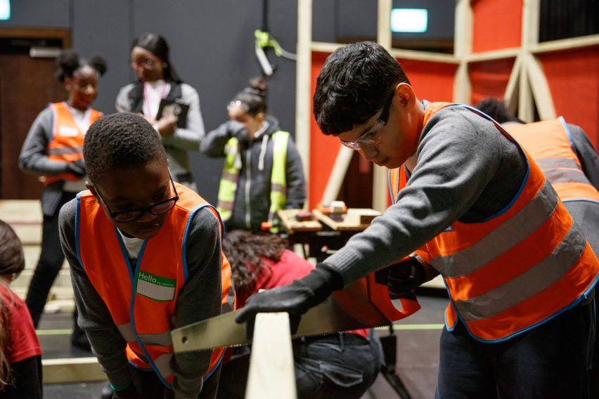 Children assembling timber stages for the Let's Build Brixton House theatre project