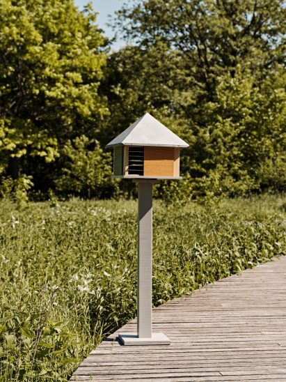 Rotating seed library on boardwalk