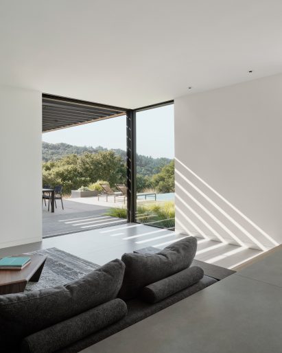 Living room with window out to pool