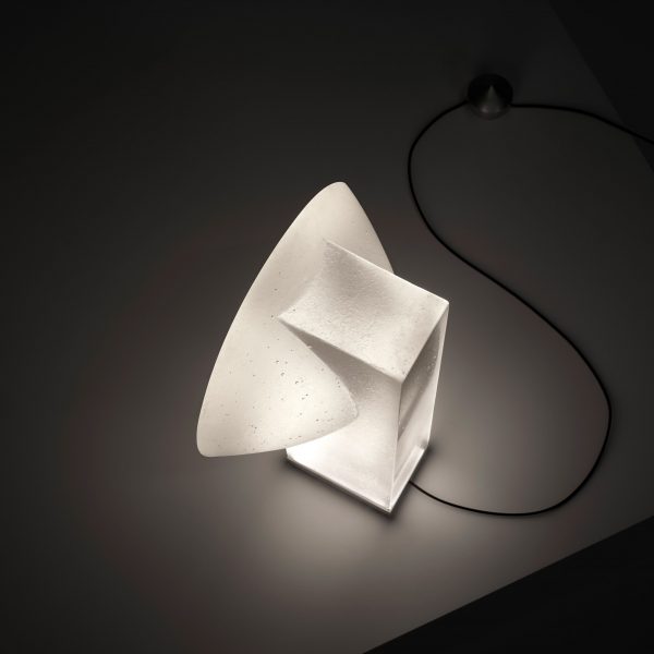 Glass lamp on table