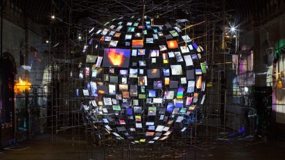 Illuminated globe shaped piece at Sarah Sze exhibition Peckham Rye