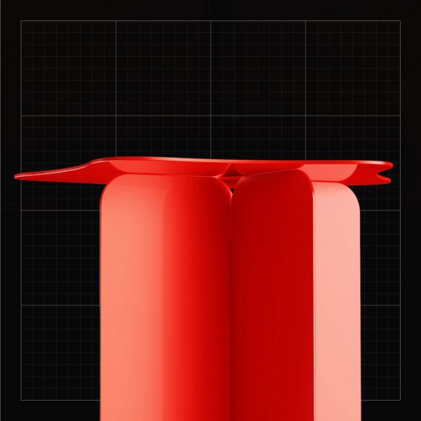 Red steel table on a black backdrop