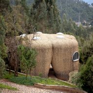 Stone research centre on a hillside at the Meles Zenawi Memorial Park by Studio Other Spaces