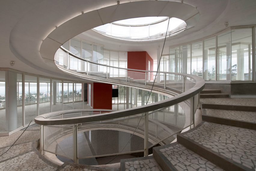 Internal spiral staircase with a circular opening in the roof