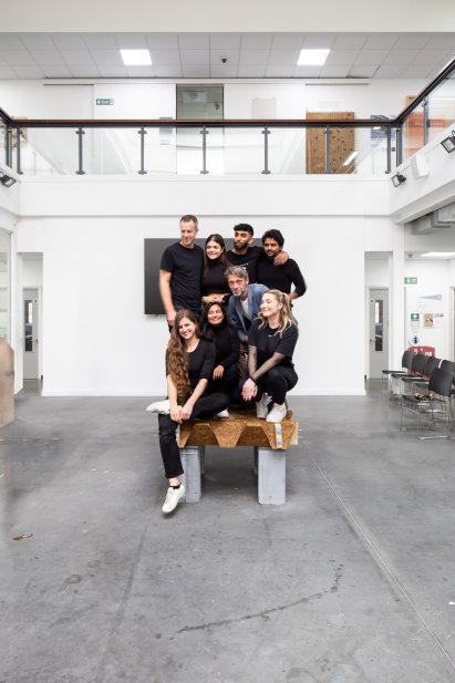 People standing on the Sugarcrete sugarcane waste construction material blocks in an interlocking grid by Grimshaw and the University of East London