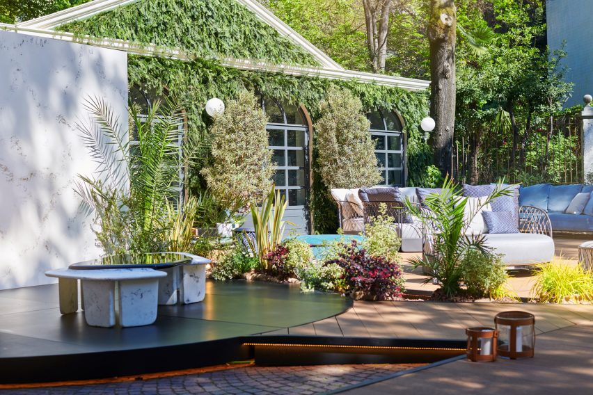 Photo of Bentley's Thames table within a garden exhibition setting at Milan design week