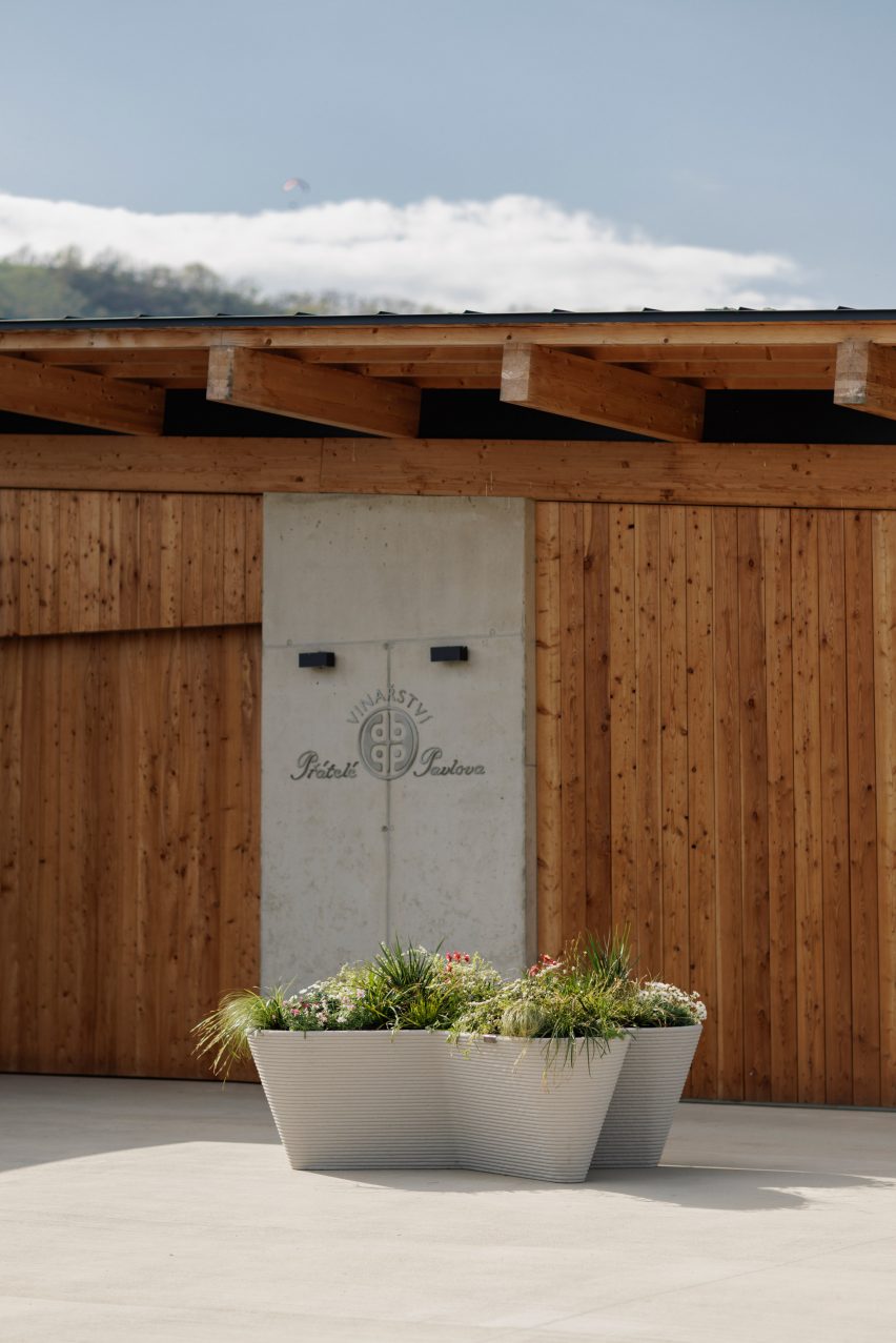 Planter in front of concrete door