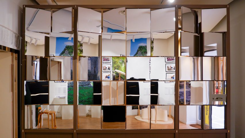 Faceted wall with reflective panels
