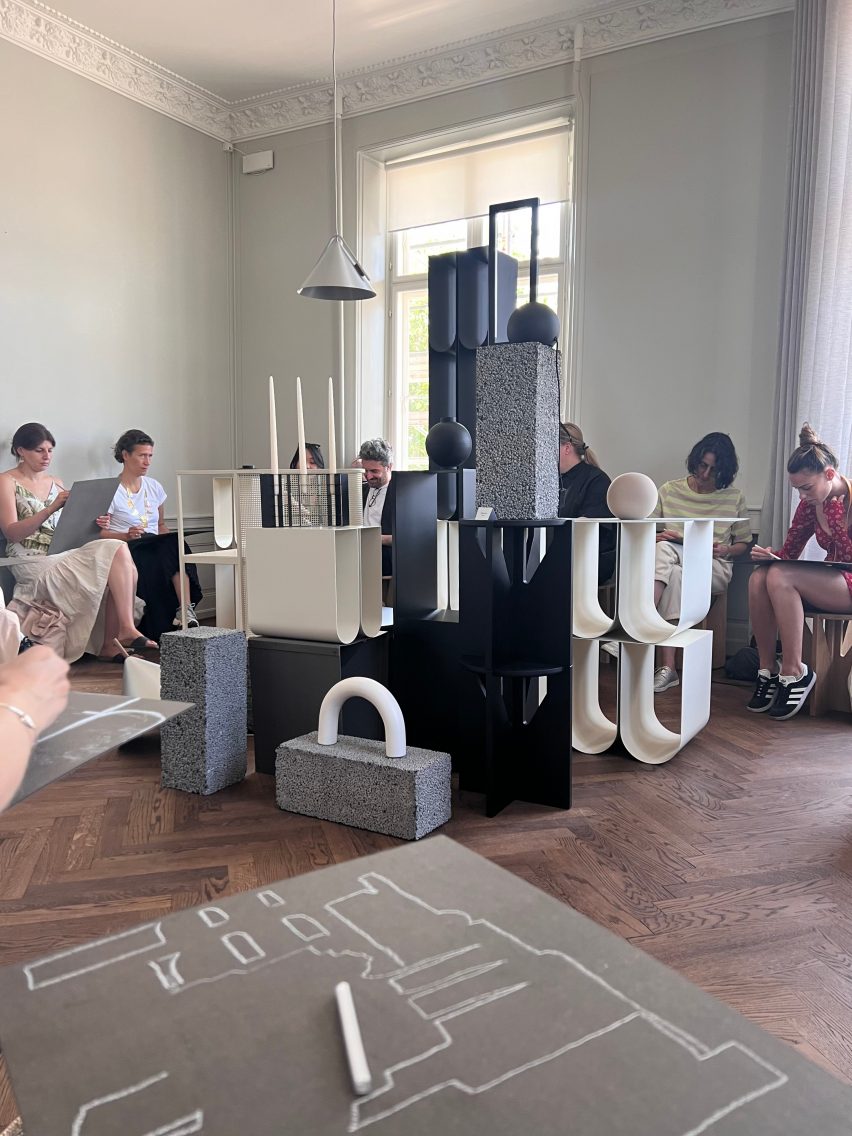 A still life drawing class is underway at the Kristina Dam Studio showroom