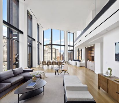 Large living and dining area with a view of City Hall