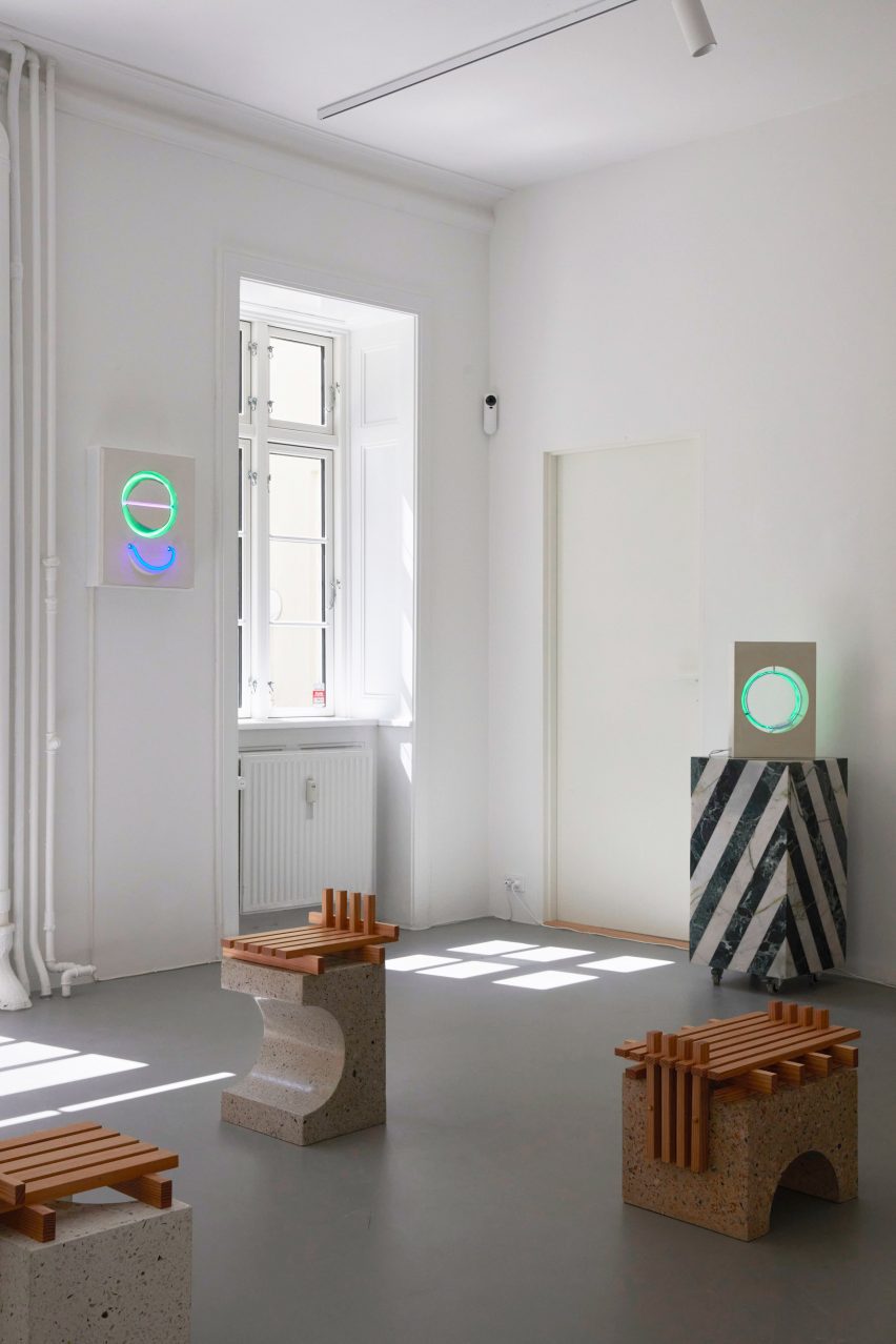 Photo of chairs and neon lights at the Kinship exhibition