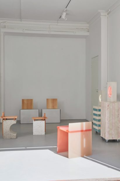 Photo of chairs and neon lights at the Kinship exhibition