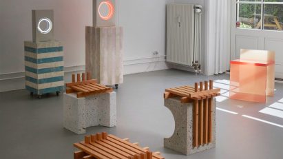 Photo of chairs and neon lights at the Kinship exhibition