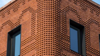New York’s Grand Mulberry clad in Glen-Gery brickwork that “adds energy to the block”