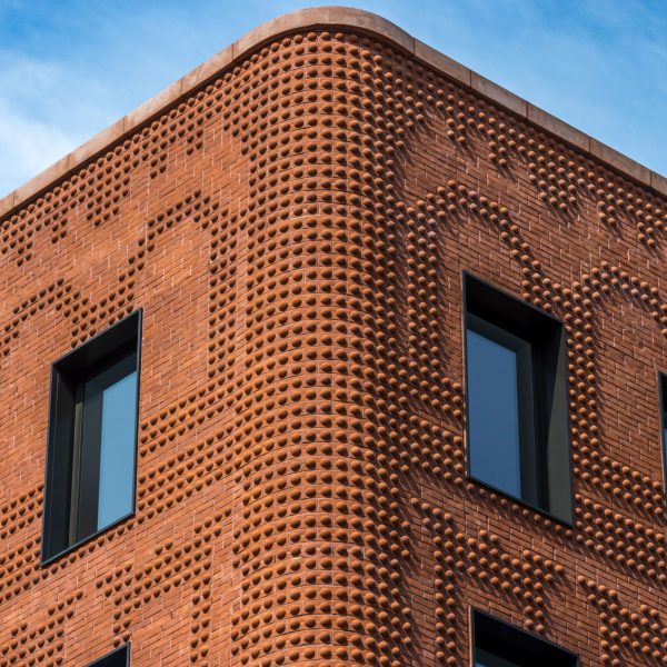 New York’s Grand Mulberry clad in Glen-Gery brickwork that “adds energy to the block”