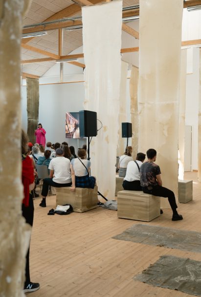 Photo of Caroline Till hosting a talk at Materials of Tomorrow
