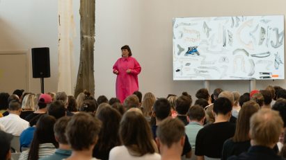 Photo of Caroline Till hosting a talk at Materials of Tomorrow