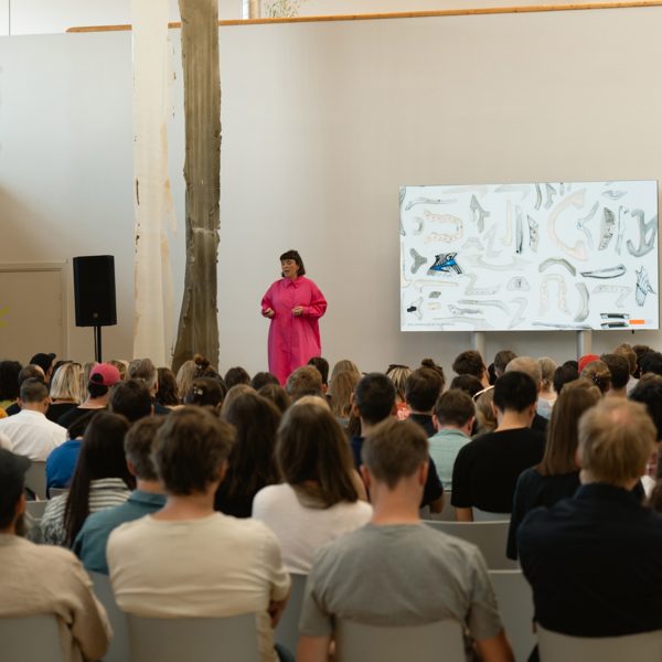 Photo of Caroline Till hosting a talk at Materials of Tomorrow