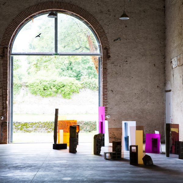Photo of installation in front of an archway