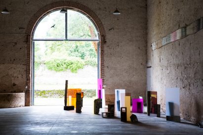 Photo of an installation in front of an archway