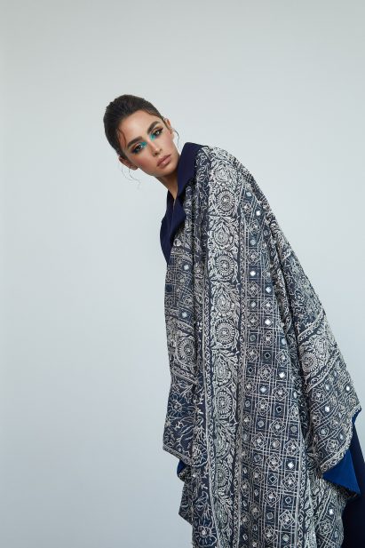 Model wearing long navy garment