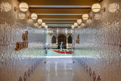Marcante-Testa Architects has turned an industrial building in Venice into the canal-side Ca' Select bar, visitor centre and production facility.