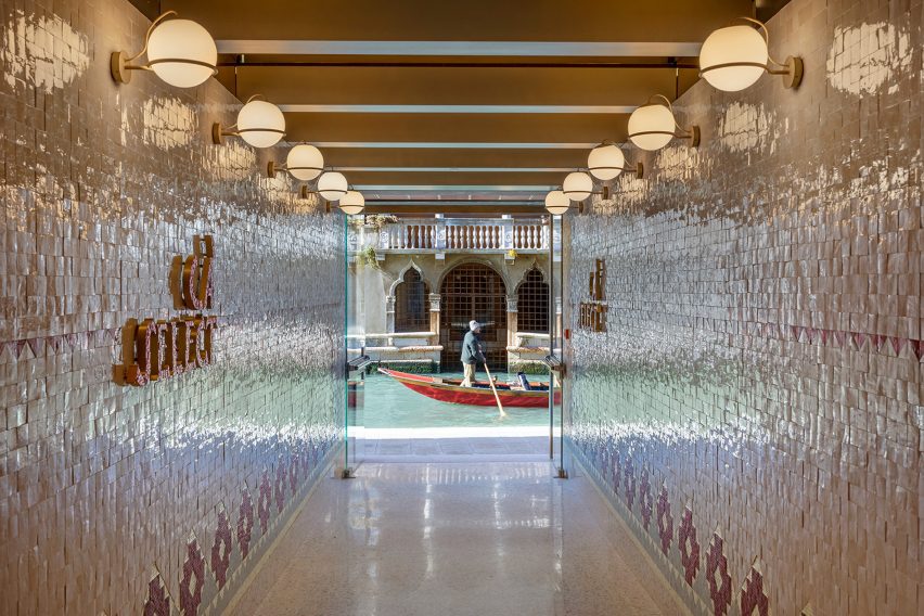 Marcante-Testa Architects has turned an industrial building in Venice into the canal-side Ca' Select bar, visitor centre and production facility.