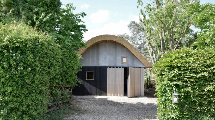 Boano Prišmontas tops art barn with curved CNC-cut roof