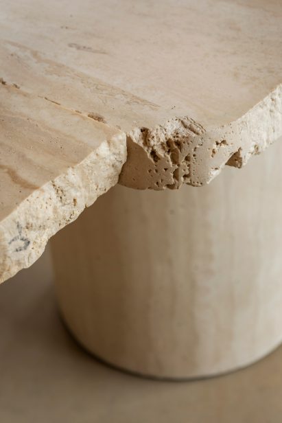 edge of travertine stone table left raw