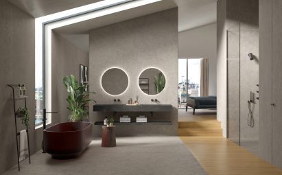 Photo showing bathroom with grey tiled walls and floors