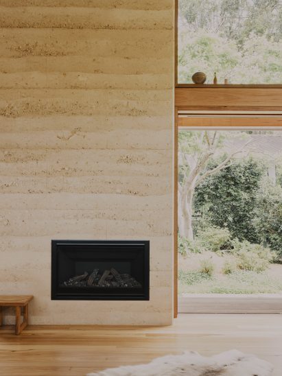 Rammed-earth chimney breast