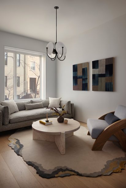 Living room with a sofa, armchair and coffee table
