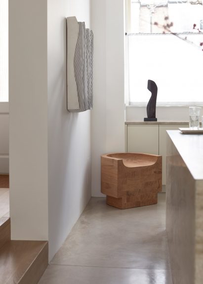 Wooden armchair in Highbury House by Daytrip Studio