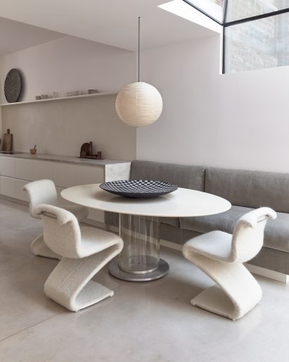 Dining table in home interior by Daytrip Studio