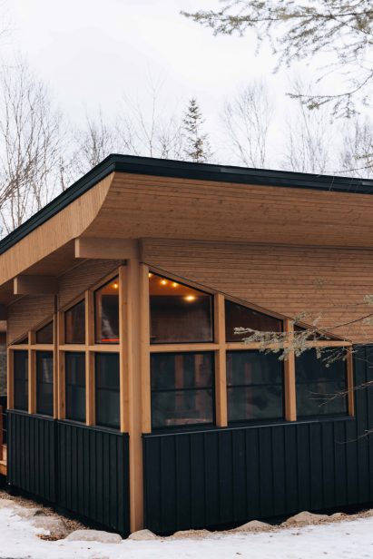 Wooden roof with windows to an interior sauna