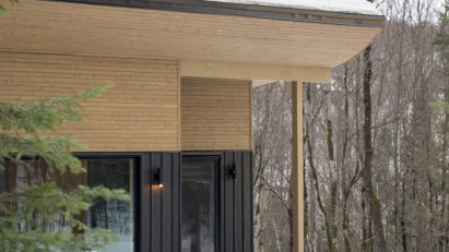 Wooden ski chalet with sloping roof
