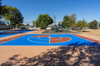 Ball court with solar reflective coating