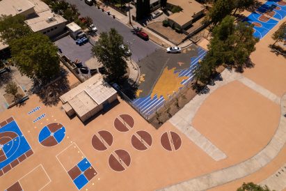 Playground with colourful solar-reflective coating