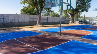 Basketball court with solar reflective coating