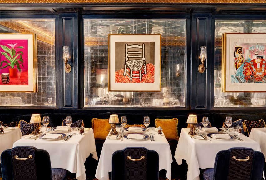 mirrored panels in dining room for hanging artwork