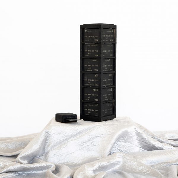 Black tower made of credit cards
