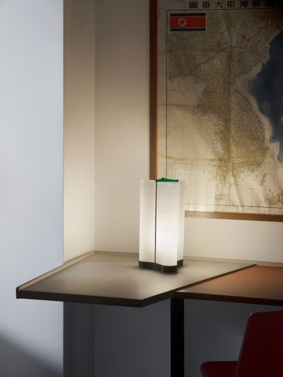 Lighting design by Le Corbusier on a wooden table