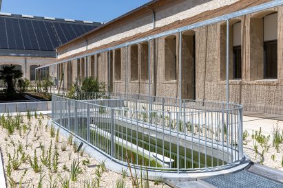 Courtyard outside of Le Magasin Électrique by Atelier Luma, Assemble and BC Architects & Studies