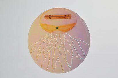 Red mirror with cracks in its surface