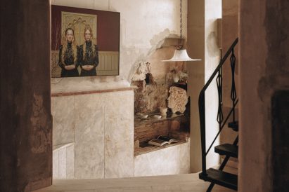 Iron staircase in the lobby of Mona Athens