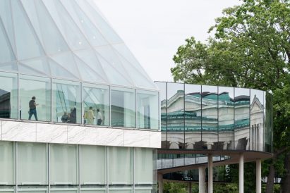 Winding, glass-clad bridge