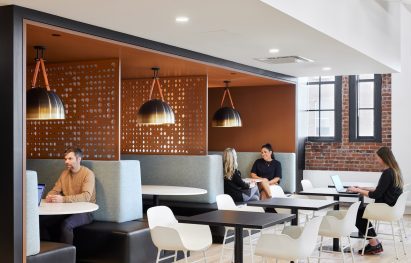 Three seating booths separated by perforated panels