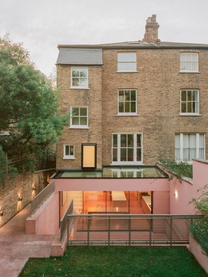 Rear of Victorian home with pink extension